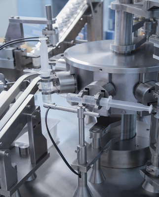 Automatic liquid Plugging Luer Lock Pre Filled Aseptic Plastic Syringe Filling Machine