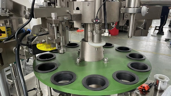 Automatic plastic tube filling and sealing machine